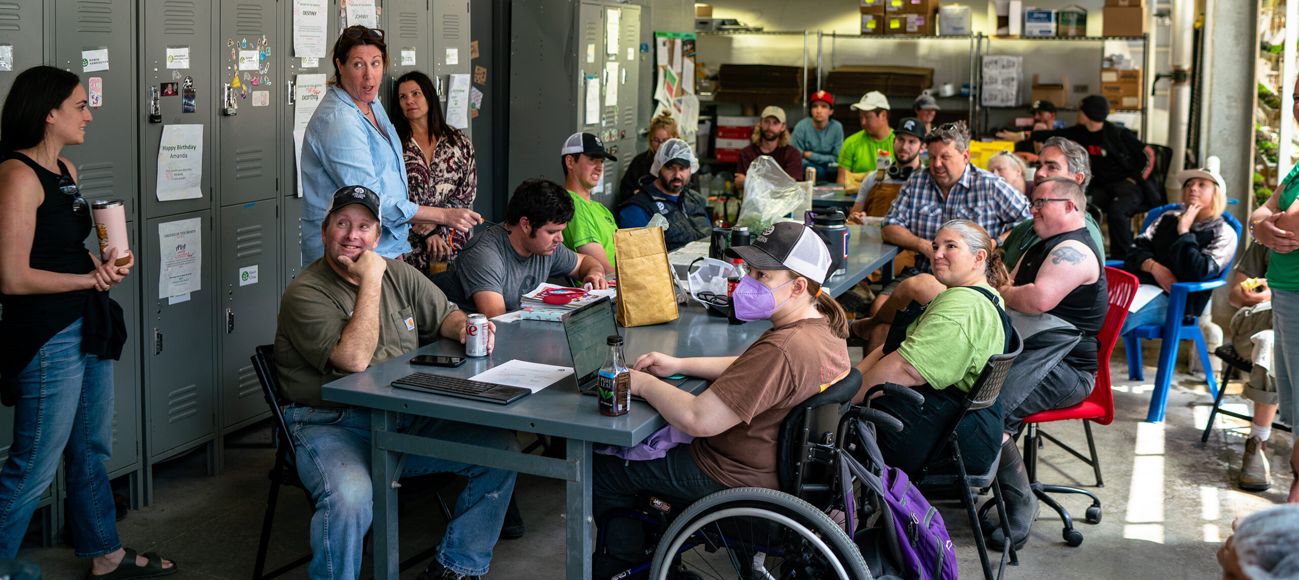Diverse group shot of Vertical Harvest employees in a Competitive Integrated Employment (CIE) organization